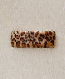 Bandeau leopard fourrure waro posé à plat sur fond beige 