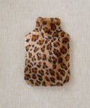 Bouillotte léopard  waro posé à plat sur fond beige 