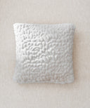 Coussin galet blanc waro posé a plat