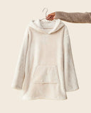Pull plaid Chill Teddy crème WARO présenté seul sur cintre, matière teddy épaisse et finition premium.