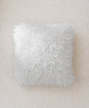 coussin blanc fourrure