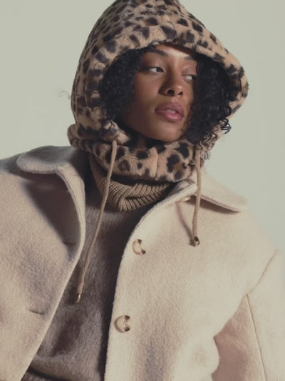 Cagoule en fausse fourrure léopard WARO, chaude et ultra douce, idéale pour un style hivernal audacieux et cocooning