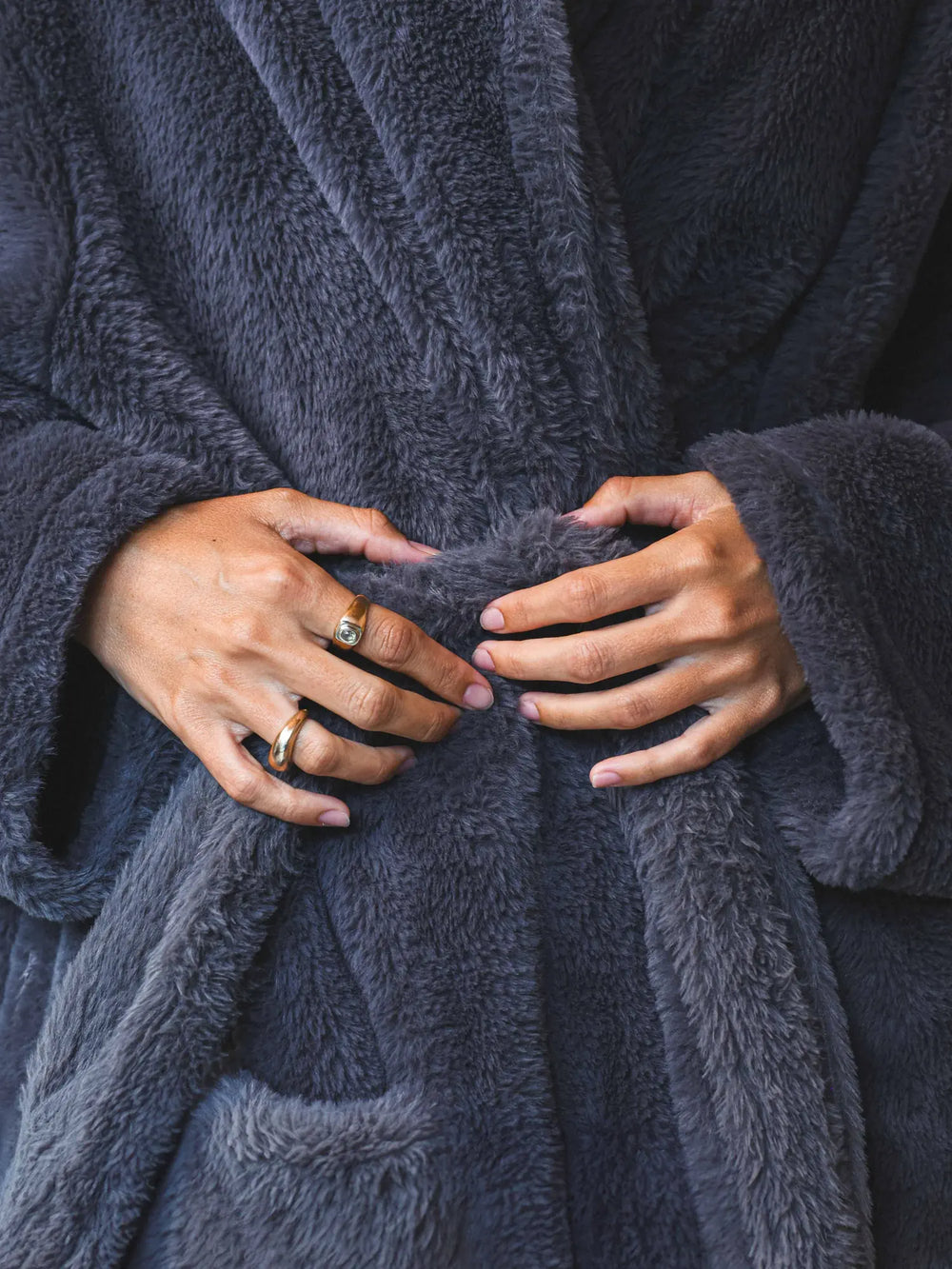 Zoom in on the WARO hotel bathrobe belt in gray faux fur, a soft, thick detail.