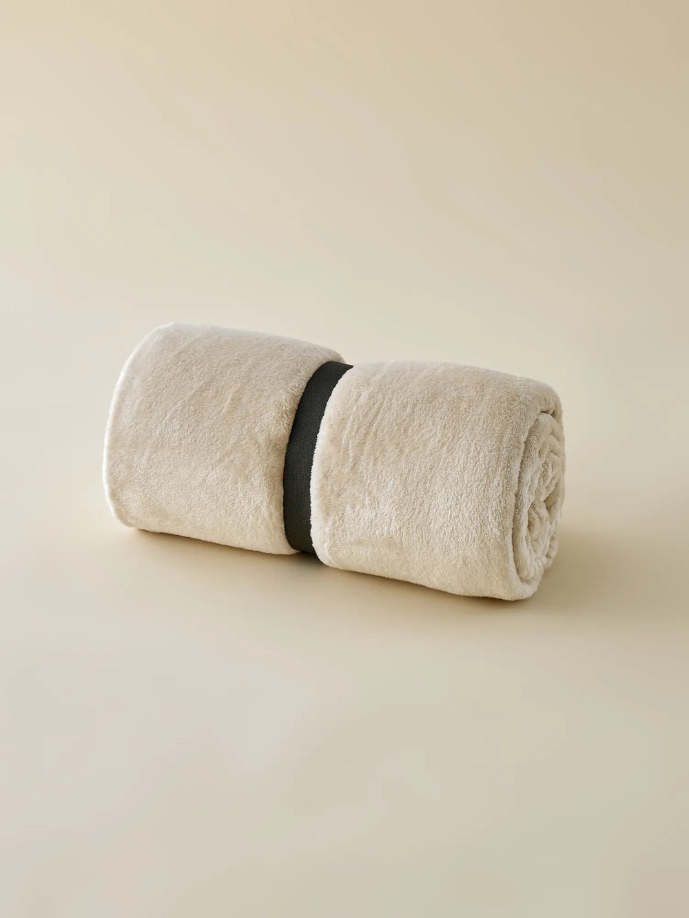 Plaid polaire Yoga beige WARO plié, présentation produit.