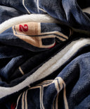 zoom matiere plaid motif telecabine